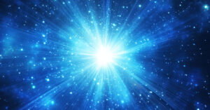 Radiating light beams from a starry blue sky