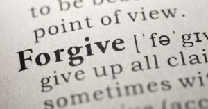 Dictionary page with the word Forgive showing the definition.